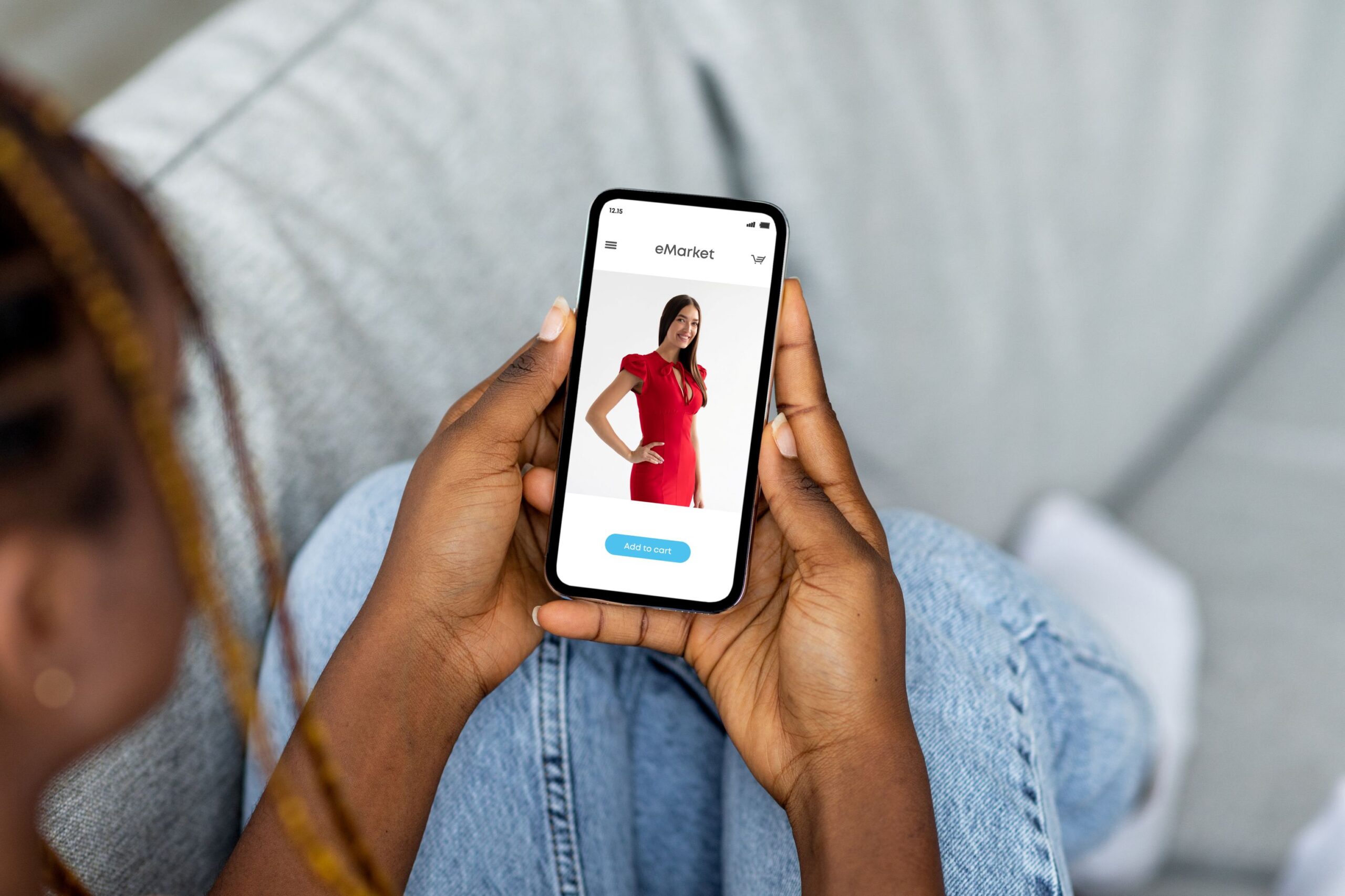 a woman holding a smartphone clicks on an online shopping site