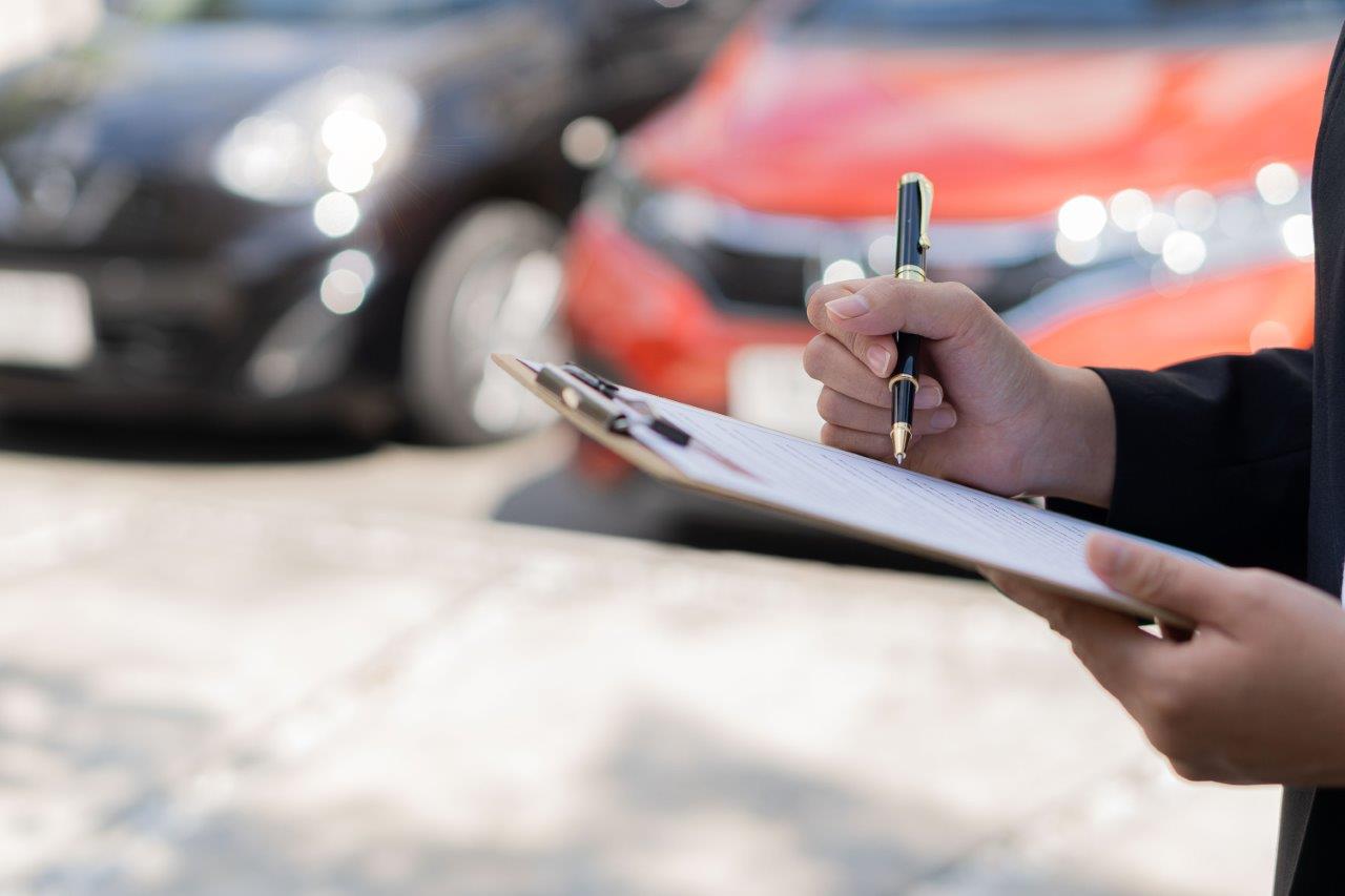 Woman fills out rental car handover form