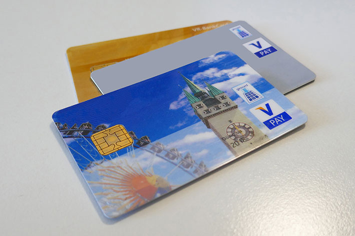 Bank cards on a white surface.