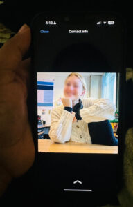 Woman sitting at her desk having a video call.